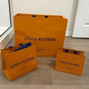 Louis Vuitton Bold Orange Bags with Blue Accents